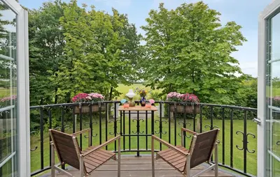 a balcony with two chairs and a table at Pet Friendly Home In Roslev With Wifi in Roslev