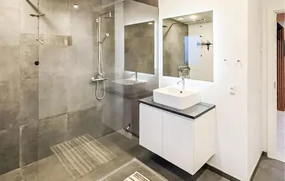 a bathroom with a white sink and a shower at Lovely Home In Spøttrup With Wifi in Spottrup