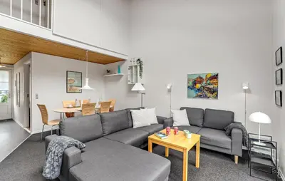 a living room with a couch and a table at Awesome Apartment In Vestervig in Vestervig