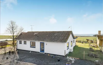 an aerial view of a white house with a yard at Beautiful Home In Nykøbing M With Wifi in Sønder Dråby