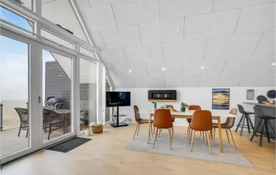 a dining room with a table and chairs at Stunning Apartment In Thisted With Wifi in Thisted