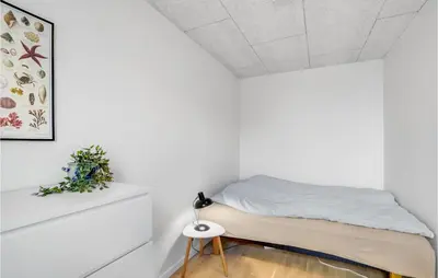 a bedroom with a bed and a white ceiling at Stunning Apartment In Thisted With Wifi in Thisted