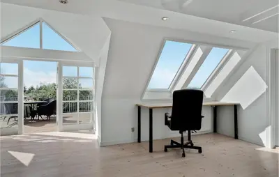 a room with a desk and a chair at Lovely Home In Aabybro With Kitchen in Åbybro