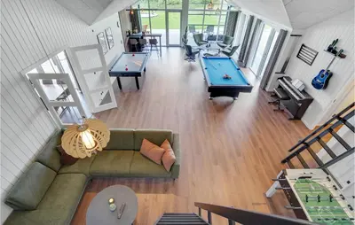 an overhead view of a living room with a couch and tables at Cozy Home In Spøttrup With Wifi in Spottrup