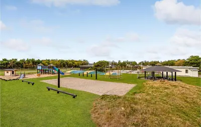 a park with a playground with a slide at Gorgeous Home In Vestervig With Kitchen in Vestervig