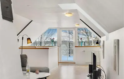 a living room with a couch and a window at Pet Friendly Home In Vils With Sauna in Vils