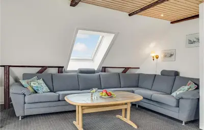 a living room with a couch and a table at Gorgeous Home In Lemvig With Wifi in Lemvig