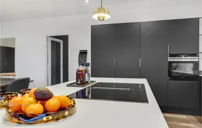 a bowl of fruit on a counter in a kitchen at Gorgeous Home In Thisted With Wifi in Thisted