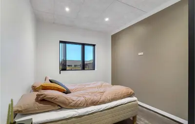 a bed in a room with a window at Gorgeous Home In Thisted With Wifi in Thisted
