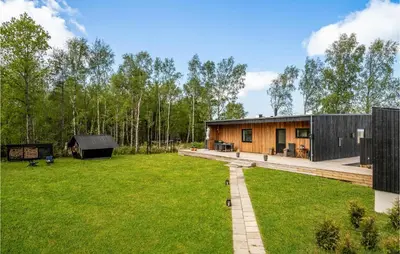 a house with a large yard with a house at 4 Bedroom Gorgeous Home In Fur in Furland