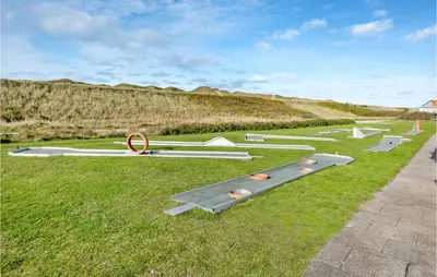a bunch of objects on the grass in a field at Gorgeous Apartment In Vestervig in Vestervig