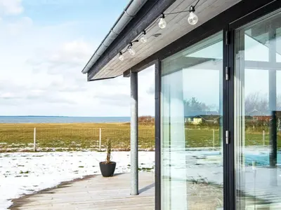 a house with a view of the ocean at Modern Cottage with Spa - By Traum Ferienwohnungen in Vinderup