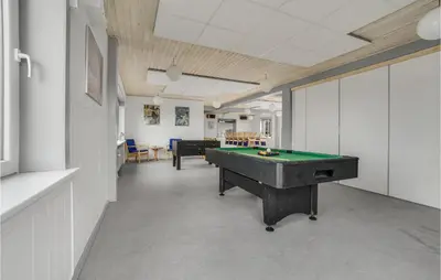 an office with a pool table in a room at 5 Bedroom Stunning Home In Hanstholm in Hanstholm