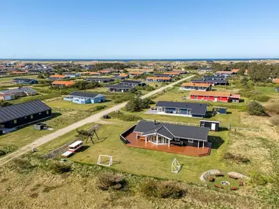 an aerial view of a village with houses at Holiday Home Floriana - 650m from the sea by Interhome in Harboør