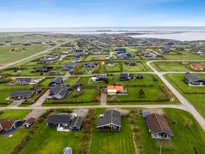 an aerial view of a resort complex with houses at Holiday Home Tanea - 700m to the fjord by Interhome in Lemvig