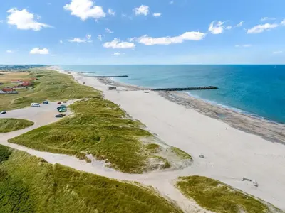 an aerial view of a beach with the ocean at Holiday Home Answald - 250m from the sea by Interhome in Harboør