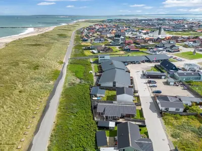 an aerial view of a town next to the beach at Holiday Home Heming - 100m from the sea by Interhome in Thyborøn