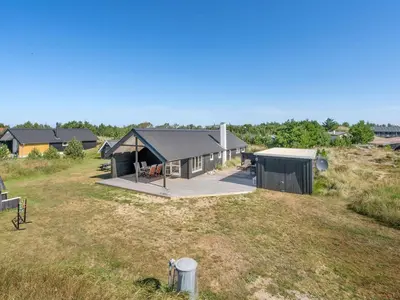 an aerial view of a house with a yard at Holiday Home Tameran - 700m from the sea by Interhome in Torsted