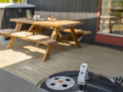 a remote control sitting on top of a table at Holiday Home Chumani - 900m from the sea by Interhome in Torsted