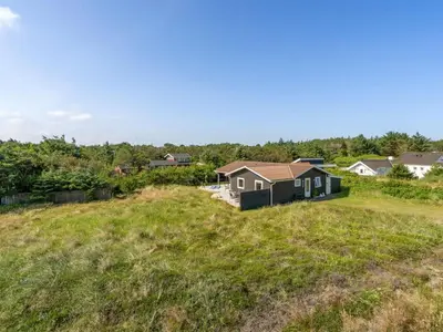 a house in the middle of a field at Holiday Home Vuokko - 400m from the sea by Interhome in Torsted