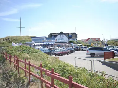 a parking lot with cars parked in a parking lot at Holiday Home Anegrete - 900m from the sea by Interhome in Torsted