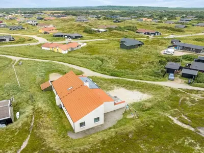 an aerial view of a house with an orange roof at Holiday Home Teijo - 400m from the sea by Interhome in Torsted