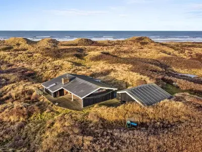 an overhead view of a house on a beach at Holiday Home Essie - 250m from the sea by Interhome in Løkken