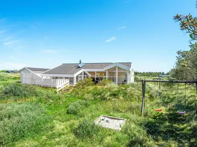 a house in the middle of a field at Holiday Home Gorica - 450m from the sea by Interhome in Løkken