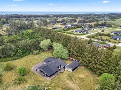 an aerial view of a house with a roof at Holiday Home Siljana - 1km from the sea by Interhome in Løkken