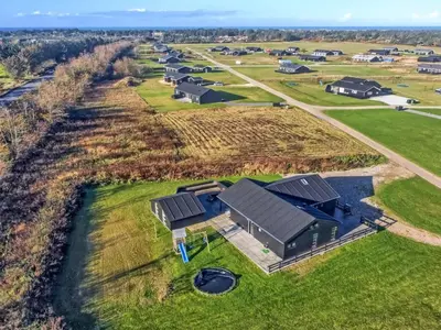 an aerial view of a farm with a group of houses at Holiday Home Aldina - 1-5km from the sea by Interhome in Løkken