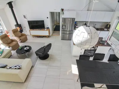 an aerial view of a living room at Holiday Home Eveline - 1-5km from the sea by Interhome in Løkken