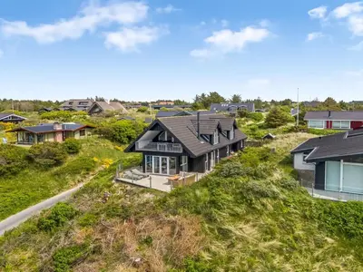 an aerial view of a house on a hill at Holiday Home Skamhals - 700m from the sea by Interhome in Blokhus