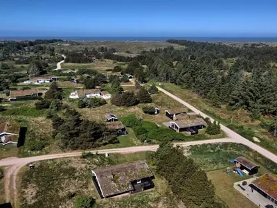 an aerial view of a farm with houses and a road at Holiday Home Anthonia - 1-6km from the sea by Interhome in Blokhus