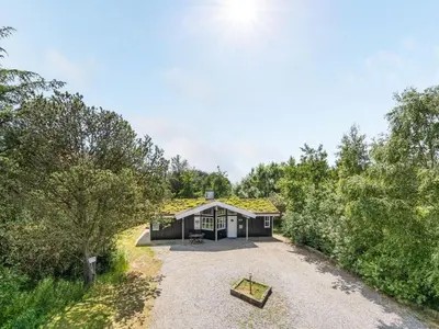 an image of a house with a driveway at Holiday Home Bina - 1-9km from the sea by Interhome in Blokhus