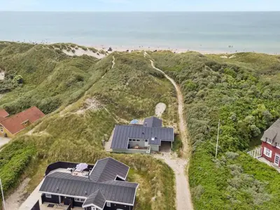an aerial view of a house on a hill at Holiday Home Erwith - 50m from the sea by Interhome in Blokhus