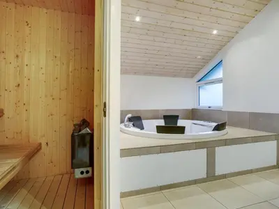 a small boat sitting on a counter in a room at Holiday Home Ricus - 1-8km from the sea by Interhome in Saltum