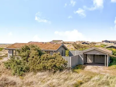 a house on top of a hill at Holiday Home Ehawee - 350m from the sea by Interhome in Saltum
