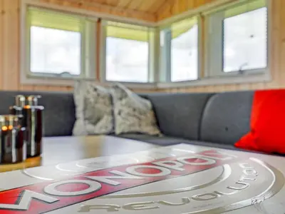 a table with a stop sign on top of it at Holiday Home Frerich - 1-5km from the sea by Interhome in Saltum