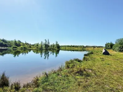 a view of a lake in a field at 6 person holiday home in Vemb-By Traum in Vemb