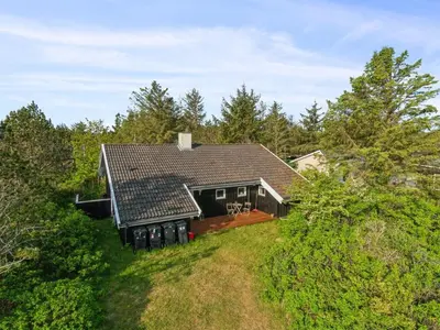 an aerial view of a house in the woods at Holiday Home Gottliebe - 850m from the sea by Interhome in Torsted