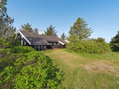 a house on the side of a hill at Holiday Home Gottliebe - 850m from the sea by Interhome in Torsted
