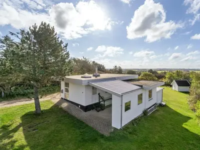 an overhead view of a white house with a yard at Holiday Home Tomine - 500m to the fjord by Interhome in Struer