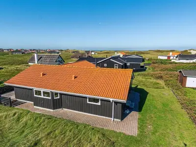 an overhead view of a house with an orange roof at Holiday Home Marissa - 200m from the sea by Interhome in Torsted