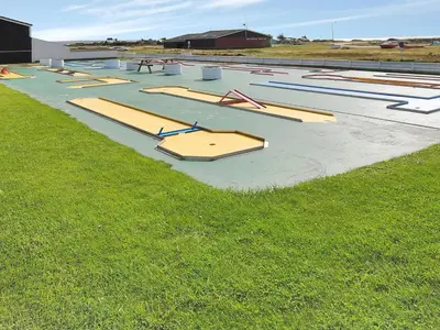 a row of empty trays on a field of grass at Apartment Eleen - 100m to the fjord by Interhome in Vestervig