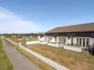 an aerial view of a building with a baseball field at Apartment Idunn - 100m to the fjord by Interhome in Vestervig