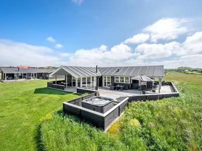 an aerial view of a house in a field at Holiday Home Nahel - 150m to the fjord by Interhome in Vinderup