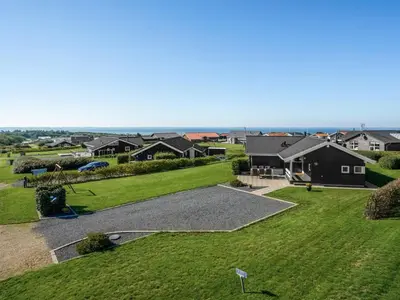 an aerial view of a yard with houses at Holiday Home Brynjolf - 350m to the fjord by Interhome in Vinderup