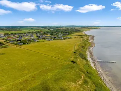 an aerial view of a town next to the ocean at Holiday Home Eberta - 200m to the fjord by Interhome in Vinderup
