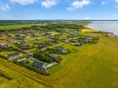 an aerial view of a campground next to the water at Holiday Home Eberta - 200m to the fjord by Interhome in Vinderup