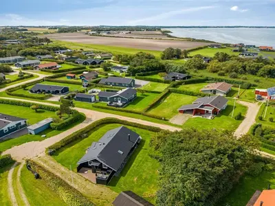 an aerial view of a village with houses at Holiday Home Naninja - 300m to the inlet by Interhome in Vinderup